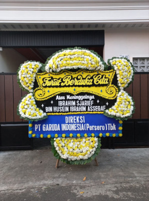 Papan Bunga Duka di Dow