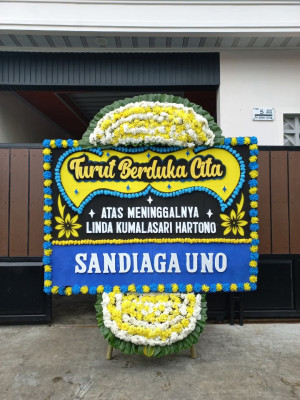 Papan Bunga Duka di Dow